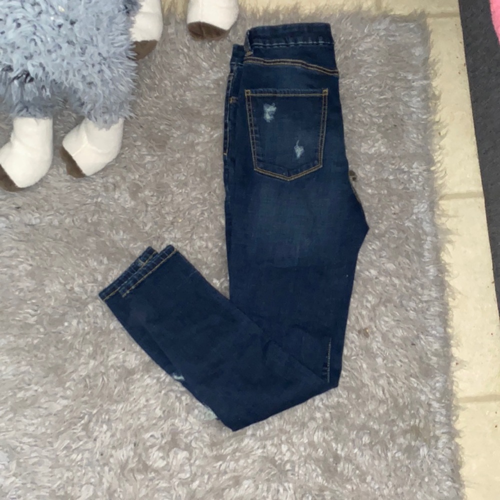 Ripped high rise jeans